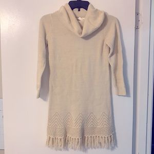 Girls Sweater Dress has a pretty stitching design at the bottom.